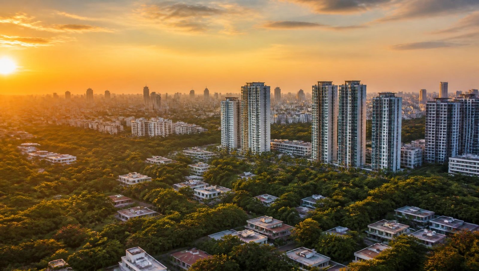 Bengaluru skyline with residential towers at sunset